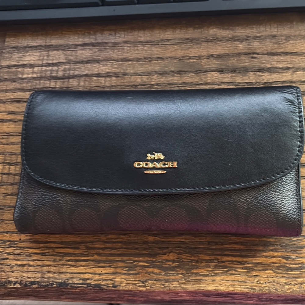 Coach Black and Brown Wallet with Flap Closure